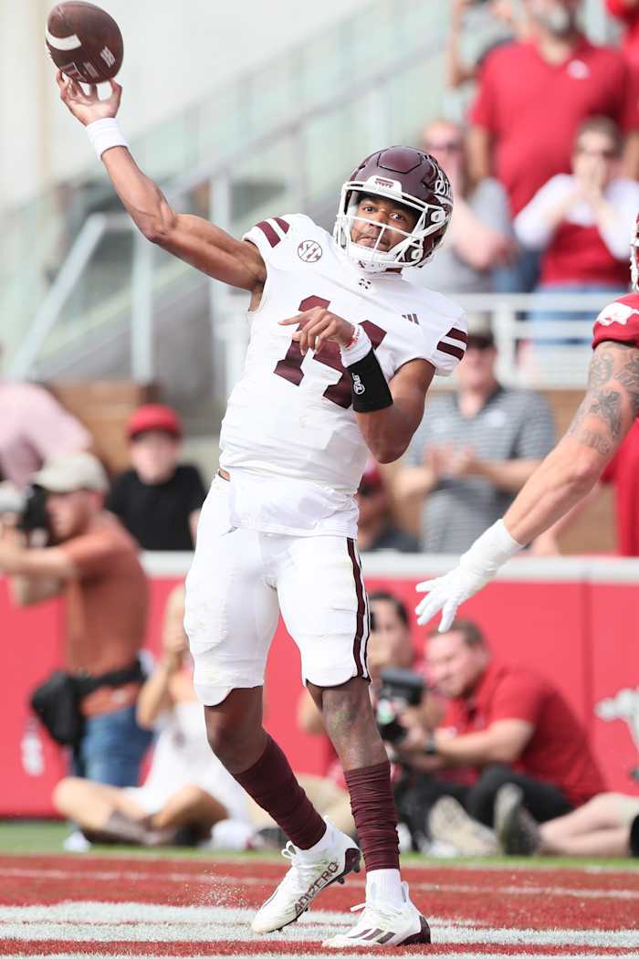 Oct 21, 2023; Fayetteville, Arkansas, USA; Mississippi State Bulldogs quarterback Mike Wright (14) throws out of the end zone against the Arkansas Razorbacks at Donald W. Reynolds Razorback Stadium. Mississippi State won 7-3. Mandatory Credit: Nelson Chenault-USA TODAY Sports